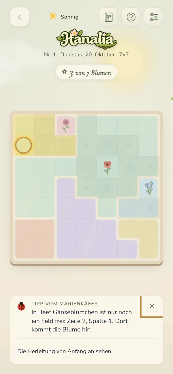 Ein Hanalia-Spielfeld mit gepflanzten Blumen und einem Tipp vom Marienkäfer